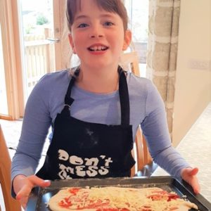 Sophie and her pizza making experience at Wallops Wood Cottages